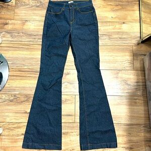 Woman’s Designer Italian made Denim Boot cut jeans. by ECO size 42 EU.